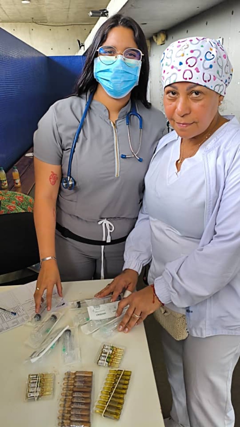 Medical day: health staff organizing donated medicine and supplies.