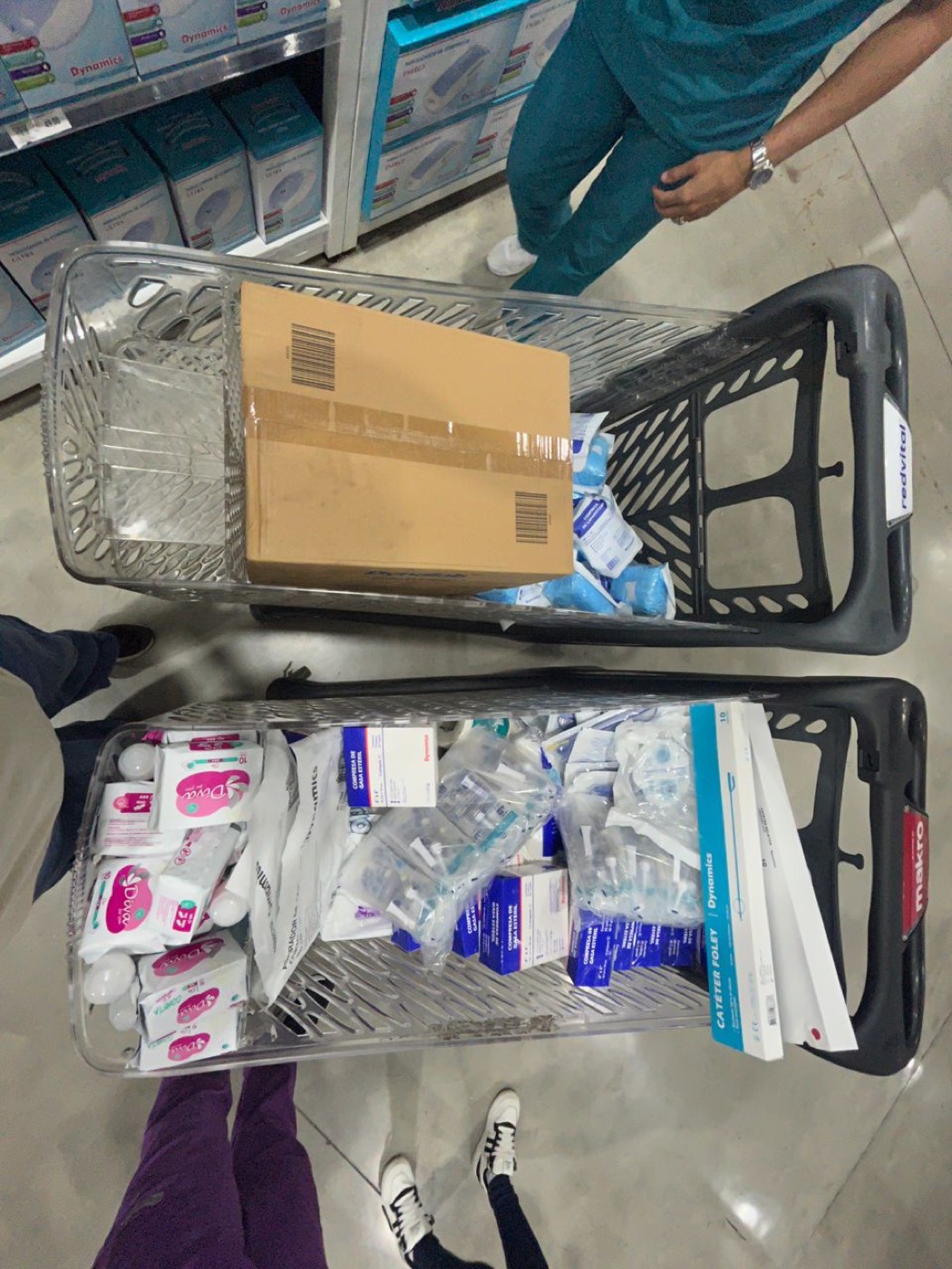 Carts of medical and hygiene supplies, ready for delivery.