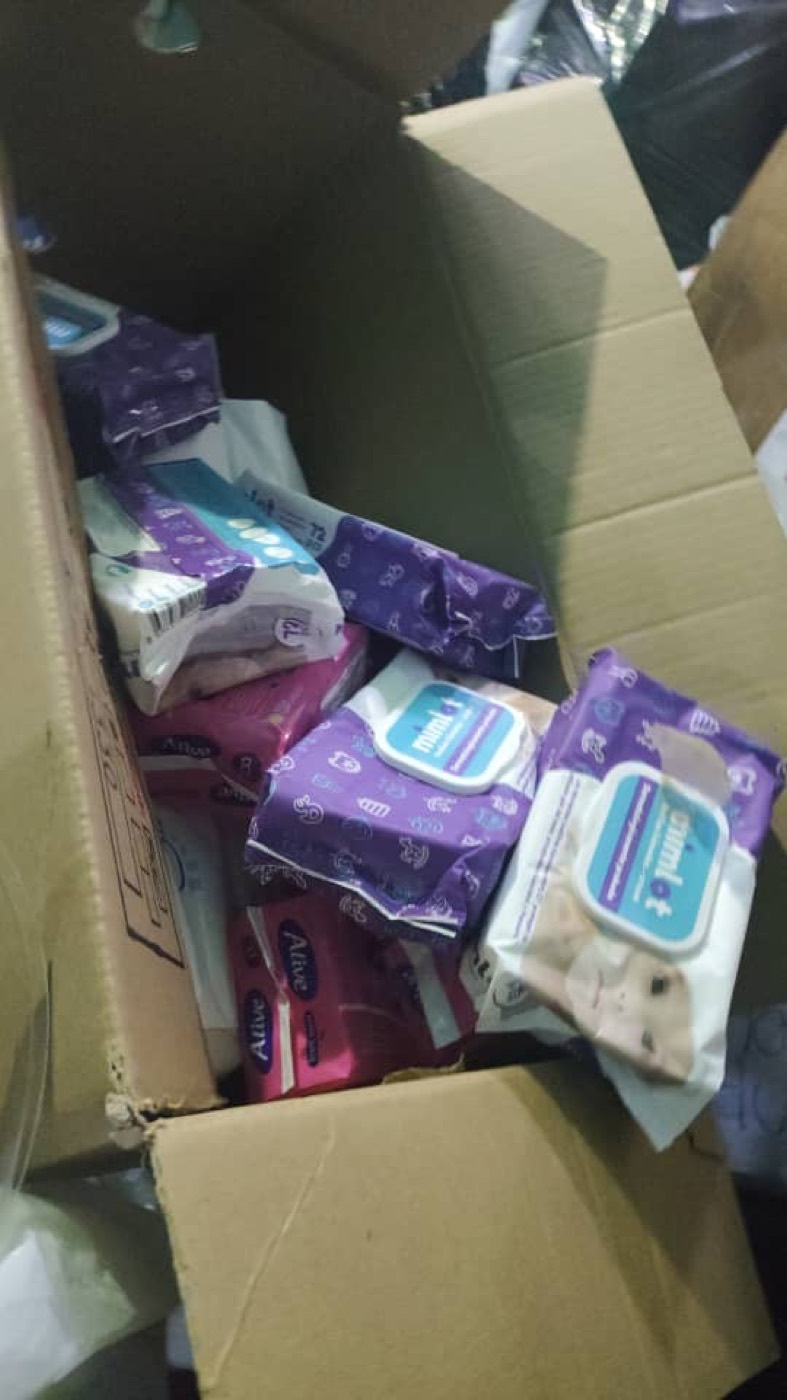 A box of donated hygiene products.